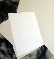 Modern art oil painting.  Geometric shapes balancing in space, greys and white, based on an abstract theme.